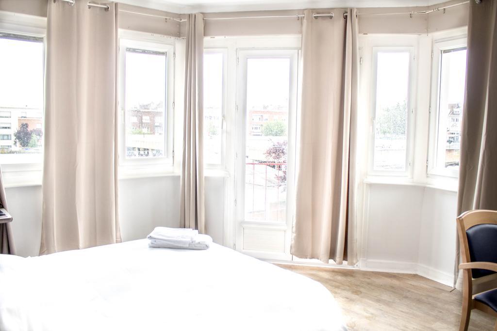 Hotel Le Jardin Lens Zimmer foto