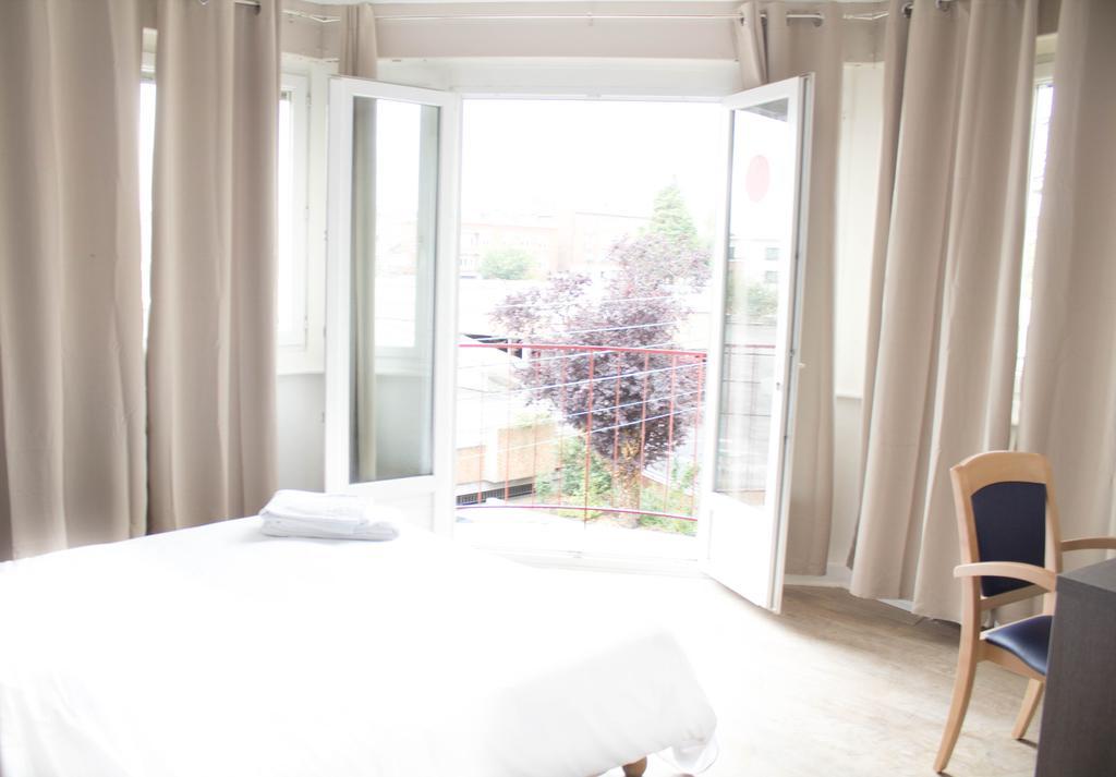 Hotel Le Jardin Lens Zimmer foto